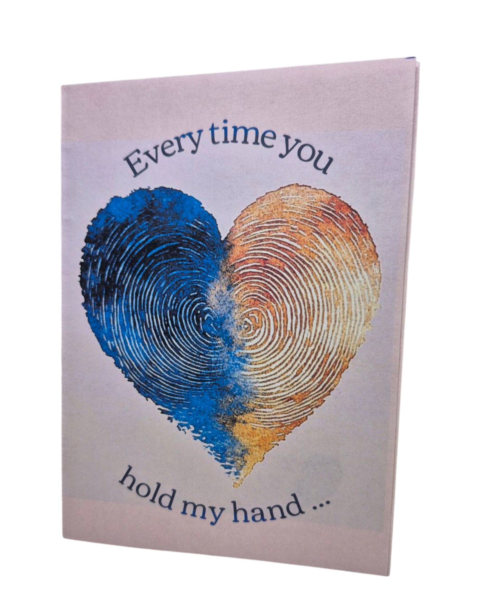 A touching sentiment expressed through a clear, high-contrast design. Two thumbprints create a heart shape on this premium A6 card. Cover reads "Every time you hold my hand," with interior message "...the world quiets down, and all I hear is my heart saying, 'Thank You.'
Quality A6 card (4.5" x 6.25") with matching envelope. Features easy-to-read text and distinct design elements