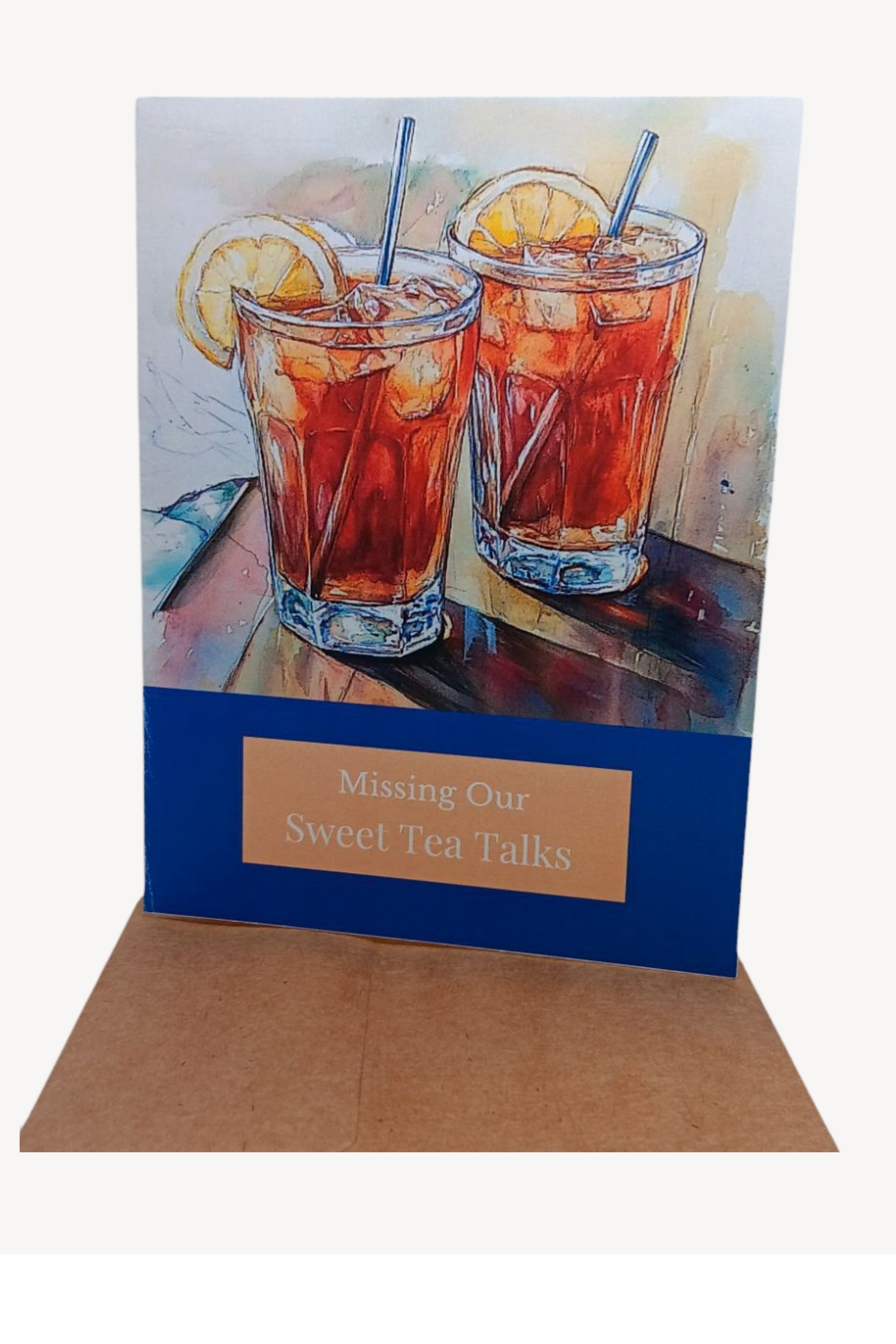Sophisticated A2 note card featuring watercolor illustration of two glasses of sweet tea on an outdoor table. Cover reads 'Missing Our Sweet Tea Talks', with message about soul-filling friendship inside. Deep Sapphire.